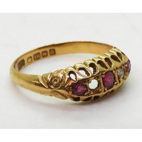 762 - An 18ct red gem & diamond ring, hallmarked Birmingham 1919, finger size O1/2, weight 3.1gms ... 