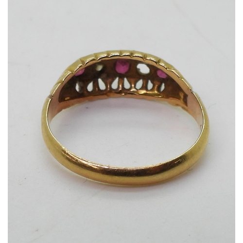 762 - An 18ct red gem & diamond ring, hallmarked Birmingham 1919, finger size O1/2, weight 3.1gms ... 