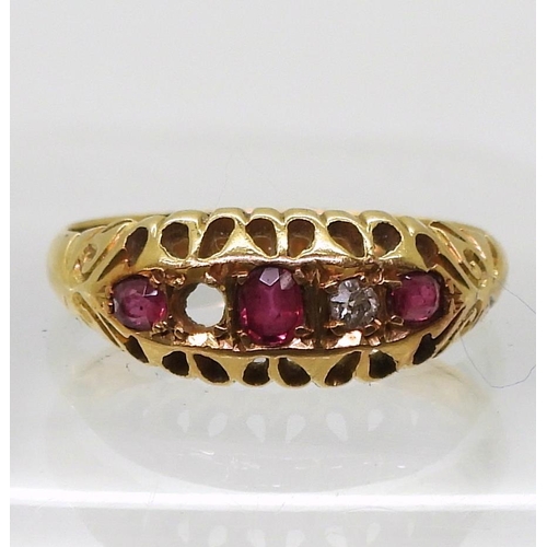 762 - An 18ct red gem & diamond ring, hallmarked Birmingham 1919, finger size O1/2, weight 3.1gms ... 