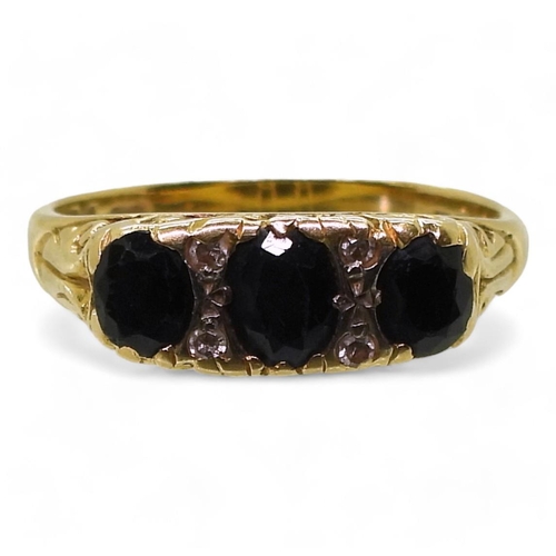 763 - An 18ct gold sapphire and diamond ring, size N, weight 4.1gms