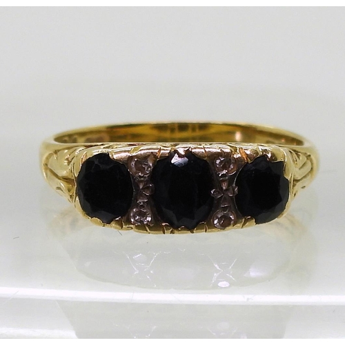 763 - An 18ct gold sapphire and diamond ring, size N, weight 4.1gms