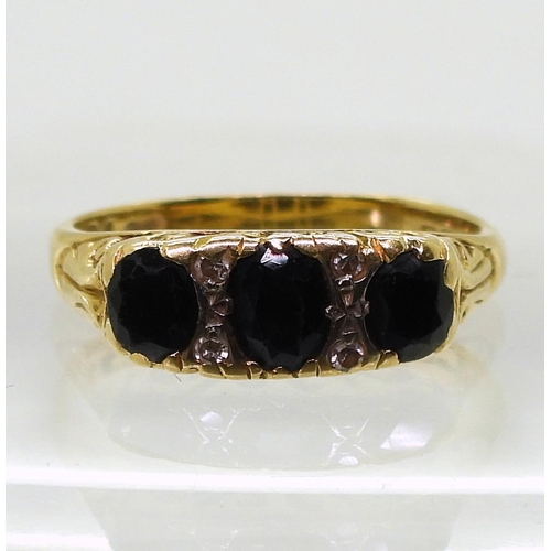 763 - An 18ct gold sapphire and diamond ring, size N, weight 4.1gms