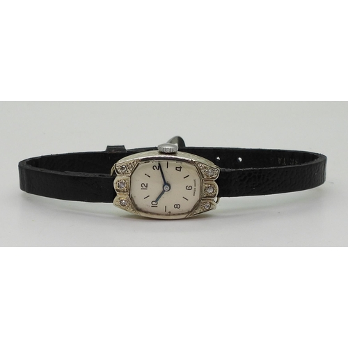 765 - An 18ct white gold ladies cocktail watch with London hallmarks for 1929, engraved case and set with ... 