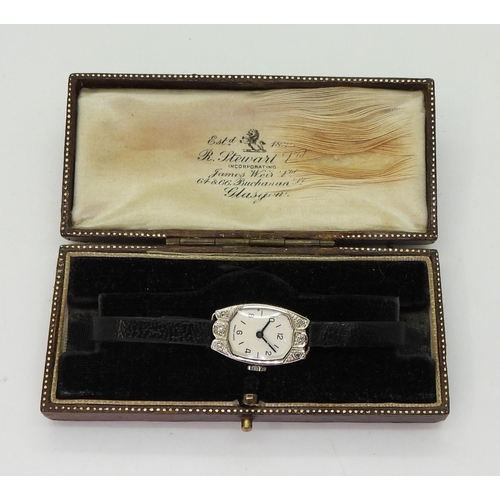 765 - An 18ct white gold ladies cocktail watch with London hallmarks for 1929, engraved case and set with ... 