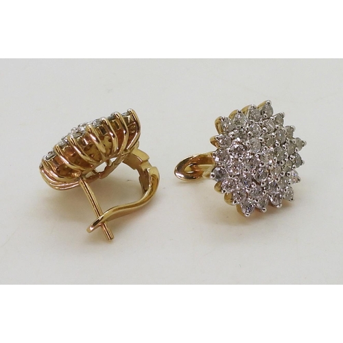 770 - A pair of 9ct gold diamond cluster earrings, diameter of the cluster 15mm, set with estimated approx... 