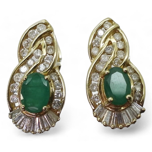 771 - A pair of 14k gold emerald and diamond earrings set with estimated approx 0.50cts of brilliant and b... 