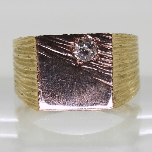 783 - A 9ct gold diamond set signet ring, size R1/2, weight 15.9gms