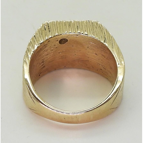 783 - A 9ct gold diamond set signet ring, size R1/2, weight 15.9gms