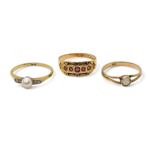 787 - three gold rings, an 18ct gold pearl and diamond ring, size N1/2 1.9gms, 15ct pearl and red gem, siz... 