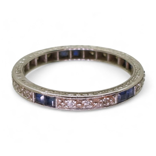 790 - An 18ct white gold sapphire and diamond eternity ring size Q1/2, weight 2.8gms