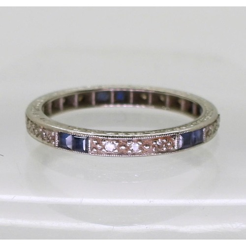 790 - An 18ct white gold sapphire and diamond eternity ring size Q1/2, weight 2.8gms