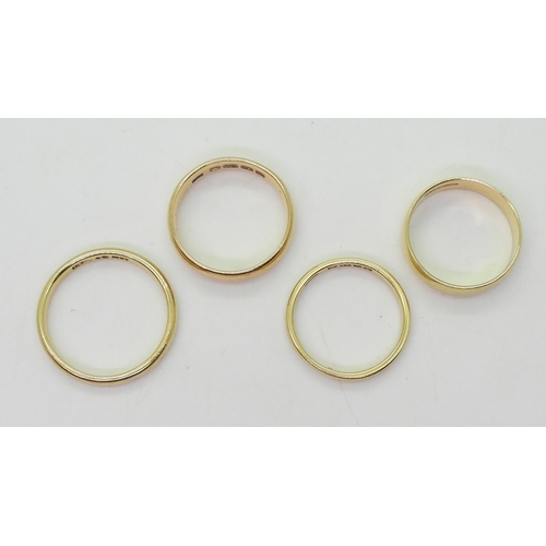 795 - Four 18ct gold wedding rings, sizes S1/2, P, O1/2 and O, weight combined 14.4gms