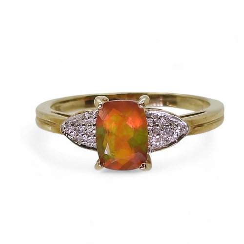 801 - A 9ct gold Rocks & Co fire opal and diamond ring, size N1/2, weight 2.1gms