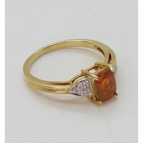 801 - A 9ct gold Rocks & Co fire opal and diamond ring, size N1/2, weight 2.1gms