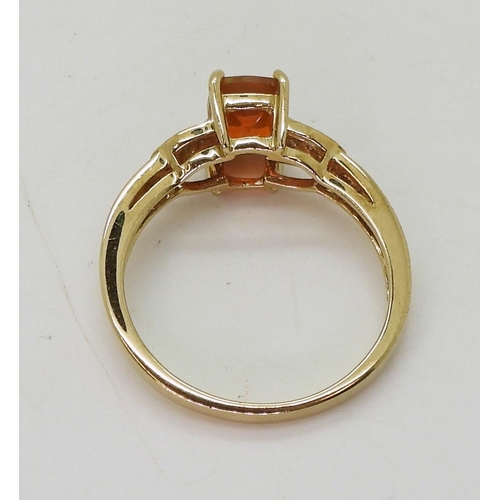 801 - A 9ct gold Rocks & Co fire opal and diamond ring, size N1/2, weight 2.1gms