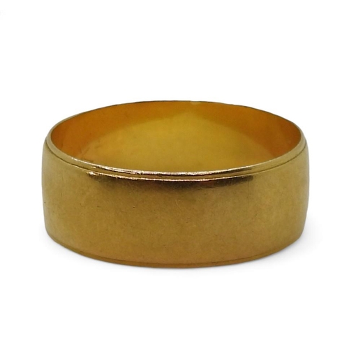 802 - A 21k gold wedding ring, size T, weight 5.6gms