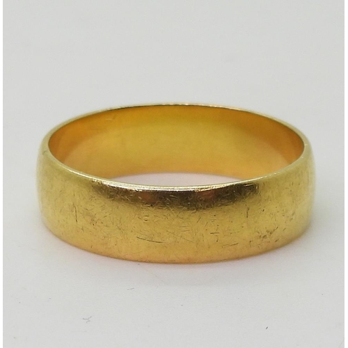 803 - A 22ct gold wedding ring, size R, weight 5.6gms