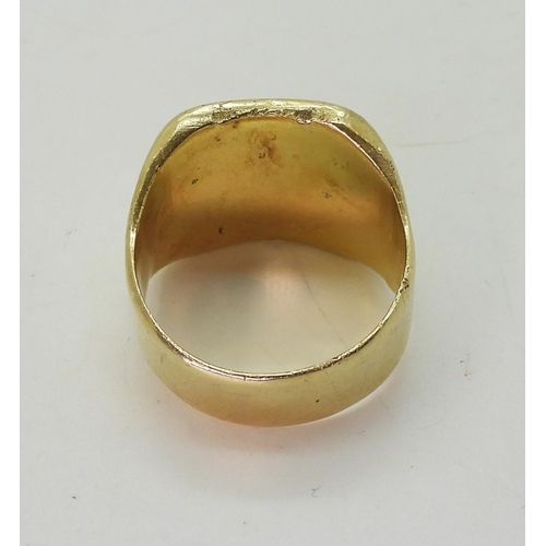 808 - A bright yellow metal signet ring, size R, weight 16.6gms