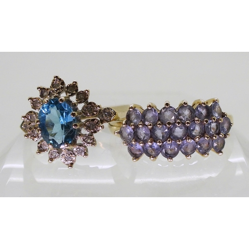 810 - A 9ct blue topaz and  diamond ring, size R, together with a 10k gold tanzanite cluster ring, si... 