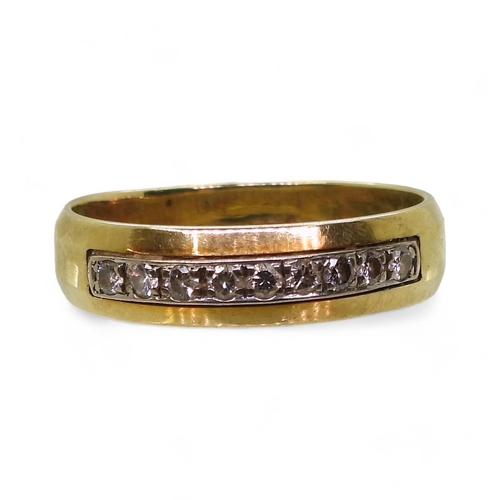 814 - A 14k gold ring set with a band of diamonds with an estimated total of 0.20cts, size u, weight 4.7gm... 