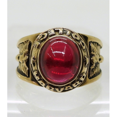 815 - A 9ct gold American College style Harvard College design, ring, set with a red gem, size Y, weight 1... 