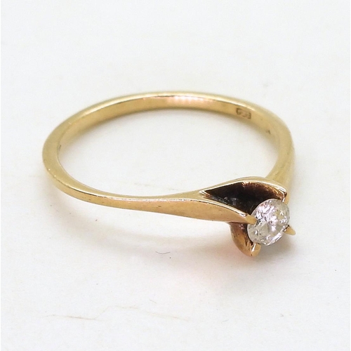 821 - A 9ct gold diamond solitaire of estimated approx 0.15cts, size N, weight 1.5gms