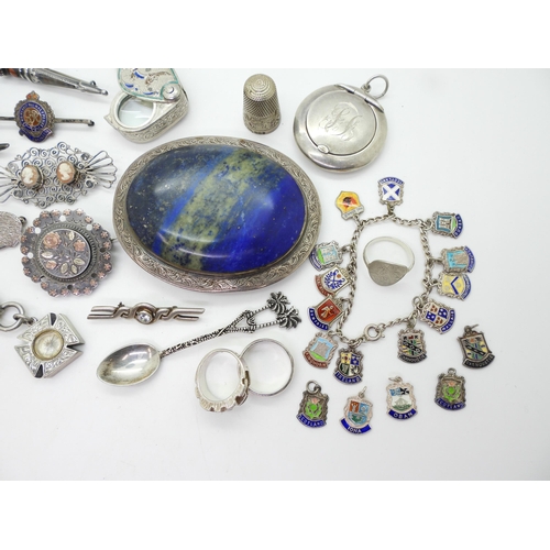 850 - A large silver lapis lazuli buckle, together with a silver compact, Shetland silver hedgehog brooch,... 