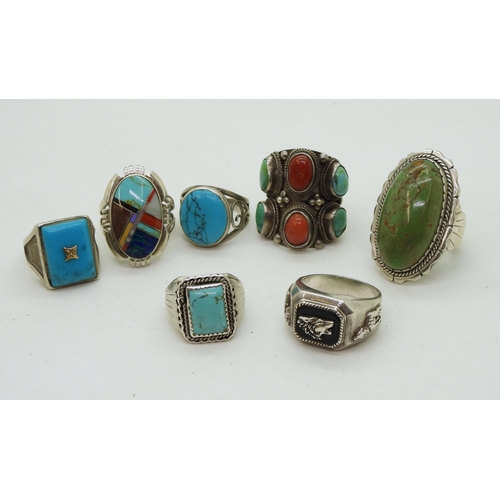 857 - A collection of first nation designed rings, to include items by both Hopi and Navajo tribes, to inc... 