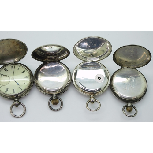 876 - Four silver pocket watches, to include a Swiss example with stop watch facility, a full hunter hallm... 