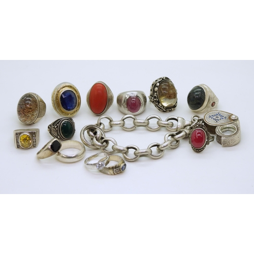 882 - A collection of silver and white metal rings, to include treated sapphire, quartz and a white metal ... 