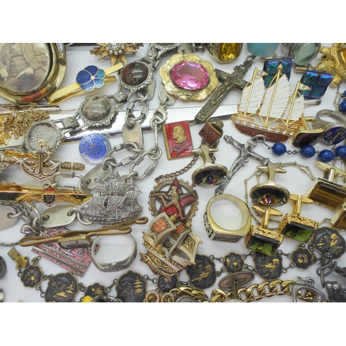 888 - A collection of vintage costume jewellery to include Russian examples, retro cufflinks tie slides, b... 