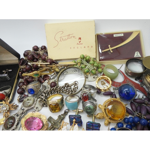 888 - A collection of vintage costume jewellery to include Russian examples, retro cufflinks tie slides, b... 