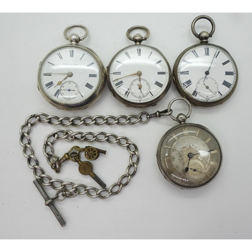 896 - Four silver open face pocket watches, and a silver fob chain with attached key and cannon charm. The... 