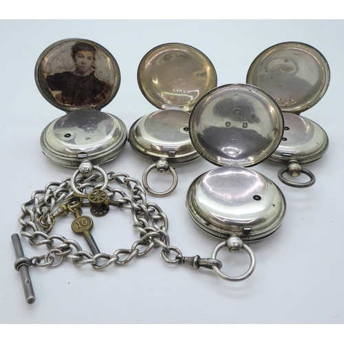 896 - Four silver open face pocket watches, and a silver fob chain with attached key and cannon charm. The... 