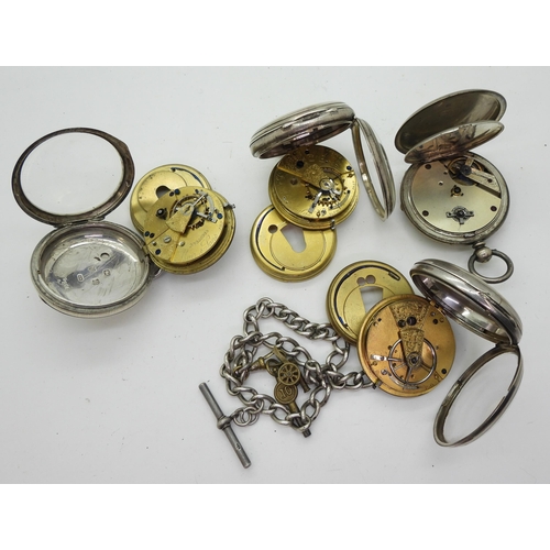 896 - Four silver open face pocket watches, and a silver fob chain with attached key and cannon charm. The... 