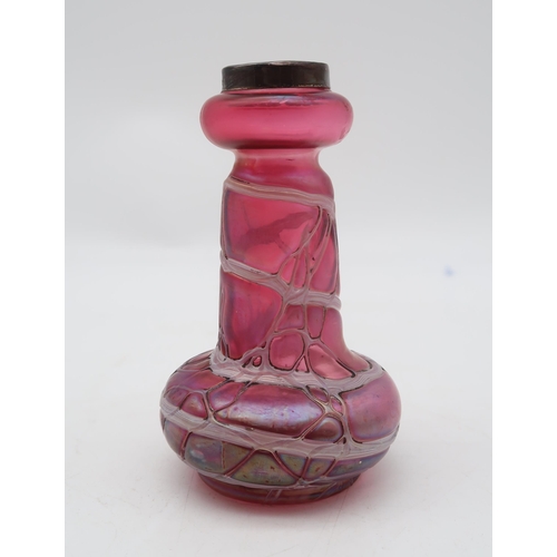 193 - A silver rimmed Loetz style vase in pink glass