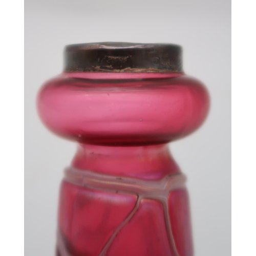 193 - A silver rimmed Loetz style vase in pink glass