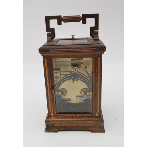 194 - A brass and glass repeating carriage clock