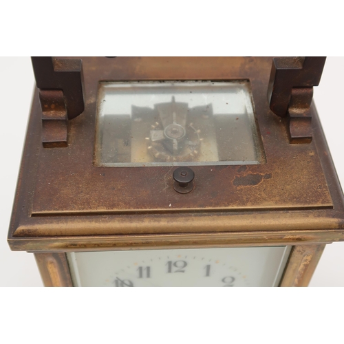 194 - A brass and glass repeating carriage clock