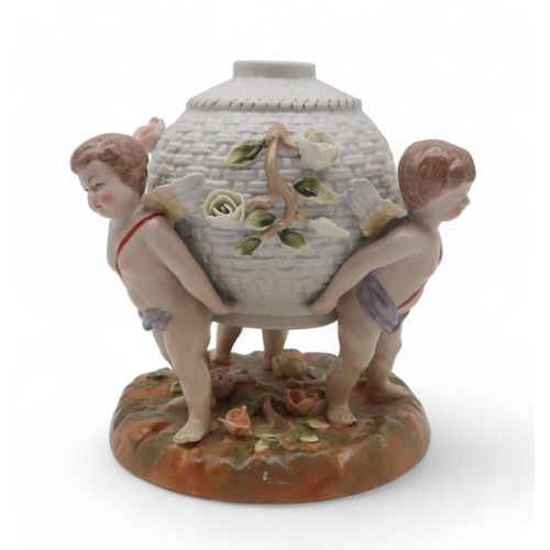 196 - A Meissen style cherub vase