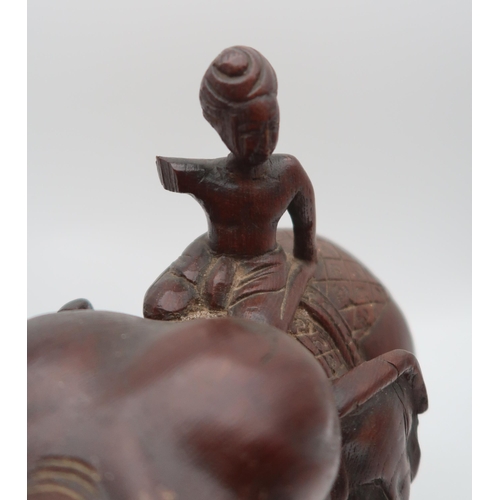 201 - A carved wooden elephant and rider