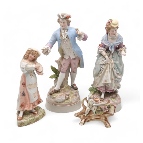 209 - A pair of Meissen style figures in 18th century dress, together with two other figures