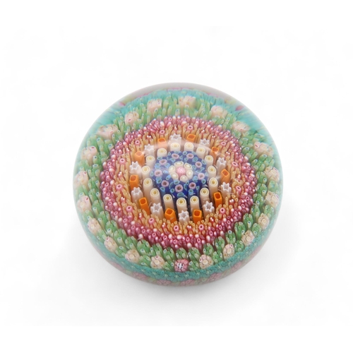 213 - A Baccarat millefiori cane paperweight, dated 1968