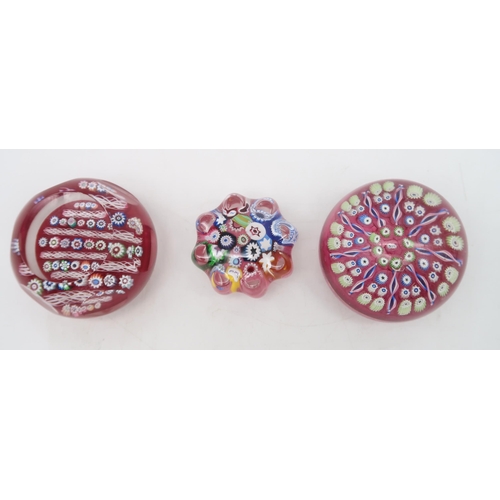 215 - A collection of John Deacons millefiori paperweights one dated 2011, two with EIIR cane, two with St... 