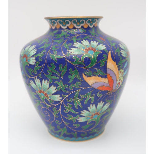 227 - A Chinese cloisonne vase, decorated with flowers and butterflies, another with apple blossoms, and a... 