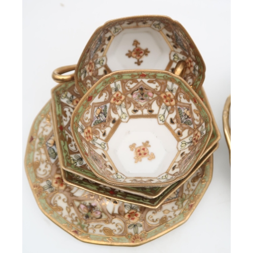 235 - A Noritake tea set the white ground with gilt and coloured decoration