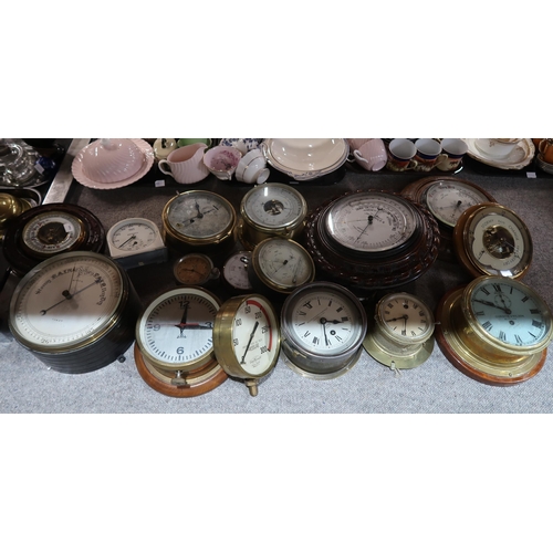 259 - A collection of assorted clocks, gauges, barometers etc