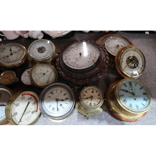 259 - A collection of assorted clocks, gauges, barometers etc