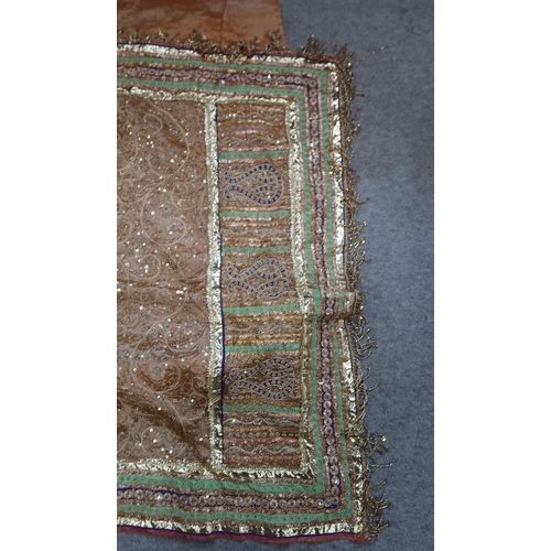 275 - A heavily embroidered wedding sari and other Indian clothing