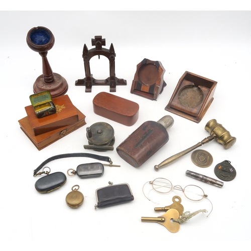 466 - Four various treen pocket watch stands, a pair of yellow metal spectacles, the bridge stamped 